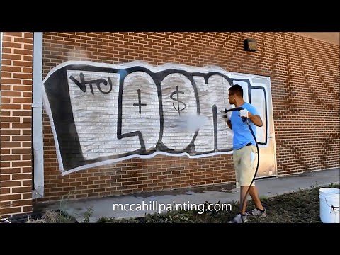 Removing Graffiti from a Brick Building - Chicagoland Graffiti Removal / McCahill Painting Co.