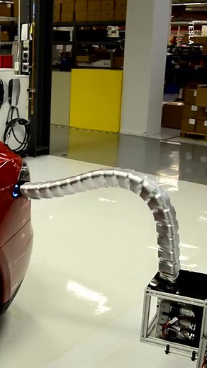 This snake shaped Tesla robot charger is seriously impressive! ⚡️ | UNILAD Tech