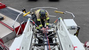 Pre-rigged aerial rope systems can save critical time. Here,1 Firefighter rigs for a litter operation while the rest of his crew packages the patient. | KD Rescue & Fabrication