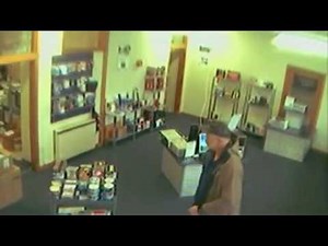 Computer theft captured on a hidden security camera