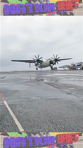 U.S NAVY C-2 Greyhound land aboard aircraft carrier USS Nimitz