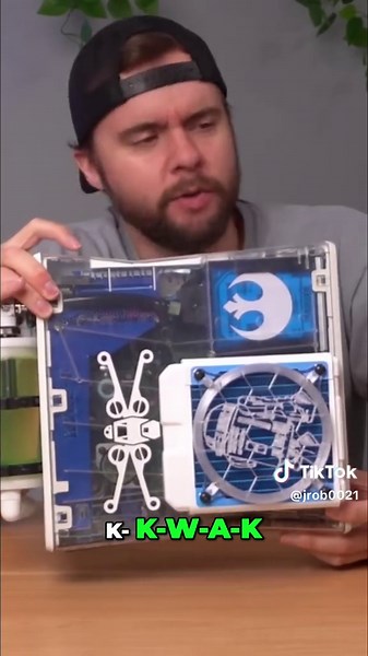 This modded Xbox console is insane! It has a radiator, 3D-printed parts, and a clear blue hard drive. Plus, the original R2-D2 case is still there! 🤖🔥 #xbox #r2d2 #modded #console #gaming