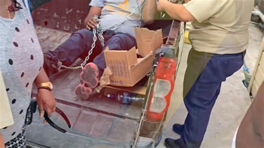 Government Warehouse Manager Charged with Theft of 43 Lenovo Laptops from MOE 43-year-old, Ezbert "Suga" Ramclam Jr., pleaded not guilty to theft of 43 Chromebook laptops that was stolen in February of this year from the Government Bookstore. He was arraigned this morning in the Belize City Magistrate's Court on Coney Drive on a single charge of theft. His family tried feverishly to block the court reporter from capturing his image. He is seen here in a gray t-shirt. Ramclam Jr., who was represe