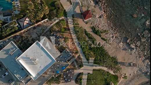 Aerial view tourist coastline with resorts in Paphos, Cyprus. Coastal rocky line of the sea with beaches in a tourist town on an island. High quality 4k footage Stock Video