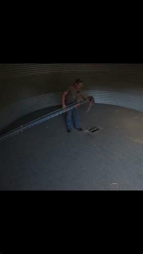 Removing the Sweep Auger After Emptying the Soybean Bin