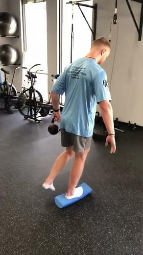Single Leg Balance Kettlebell Around the World