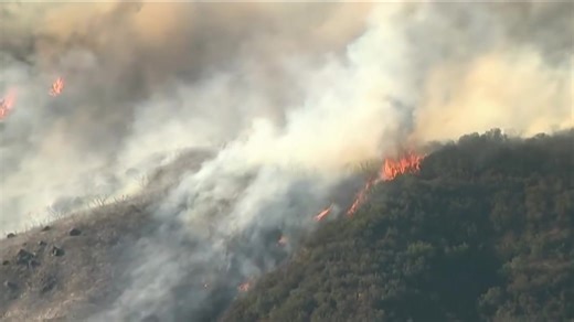 Firefighters battle Sandia Fire in Northeastern San Diego County Tuesday afternoon. As of 6:30 p.m., the forward rate of spread had been stopped, and the fire was mapped at 24 acres with 10% containment. | CBS 8 San Diego