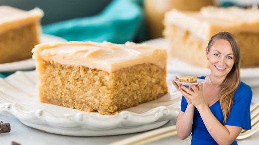 This Peanut Butter Sheet Cake takes less than an hour to make from start to finish. It’s topped with a fudgy, candied peanut butter icing that’s out-of-this-world amazing! Recipe: https://sugarspunrun.com/peanut-butter-sheet-cake/ | Sugar Spun Run