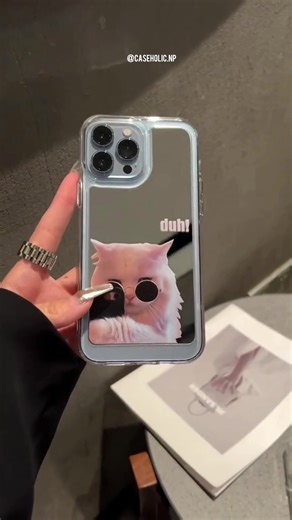 Stylish Mirror Cat Phone Case Features A Trendy And Fun Design With A Cool Cat Wearing Sunglasses And The Word “Duh!” Printed Beside It. Made From High-Quality Transparent TPU Material, It Provides Strong Protection Against Scratches, Drops, And Daily Wear. The Mirror Back Adds A Touch Of Elegance While Also Being Useful For Quick Touch-Ups. With Precise Cutouts And A Slim Fit, This Case Ensures Comfortable Grip And Easy Access To All Buttons And Ports. Perfect For Those Who Want A Mix Of Fashio