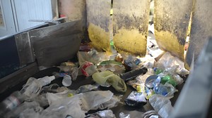 Download Plastic Trash waste moving on a Conveyor at the Garbage sorting Station for free