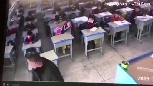 Teacher violently drags young student and beats her with stick