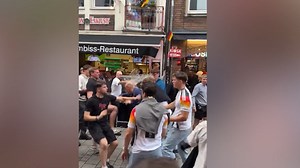 German fans clash with English supporters after disrespectful chant following Euro KO