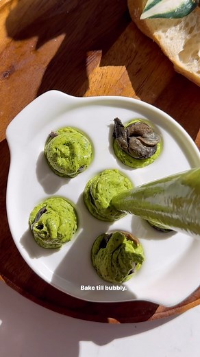 Nadia Aidi on Instagram: "Escargot…as a former restaurant chef, this is one of the must requested recipes and to this day my favorite thing to get at restaurants and now I’m sharing my home version with you ❤️. Obviously fresh escargot is better (tough to get though) but don’t be put off by the can! They are delicious and easy to get. Ingredients: •8 oz unsalted room temp butter. •1 bunch flat leaf parsley. •1 head of garlic. •1 shallot (chopped). •dash of nutmeg. •2 tsp caper juice. •salt and p