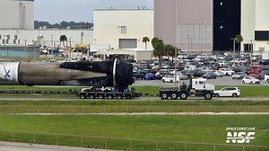 A SpaceX Falcon 9 fairing and a booster (B1096-3) rolled by the @NASASpaceflight Space Coast Live cameras on their way to final processing at the launch pad. While the booster is schedule to launch on Monday, the fairings and payload's mission is unknown. | NASASpaceflight.com