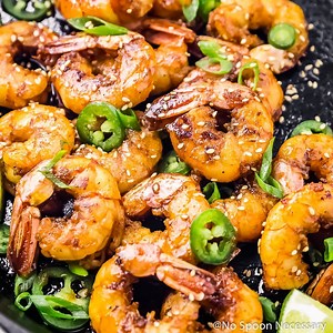 These SPICY HONEY GARLIC SHRIMP are sweet, sticky and loaded with flavor! This easy shrimp recipe is made in one skillet, with only 8 ingredients & ready, from prep to finish, in just 16 minutes! Printable Recipe: http://www.nospoonnecessary.com/spicy-honey-glazed-skillet-shrimp/ | No Spoon Necessary - Unique Seasonal Recipes