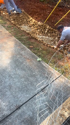 A dry creek bed does more than look good — it redirects water and protects your yard from erosion. Here’s a look at the detail that goes into every rock we place. No shortcuts. Just craftsmanship, function, and clean results. DM for a quote on French drains, grading, or creek beds. | Copper Ridge Landscaping