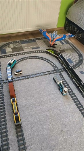 Lego 60336 and two Lego 60337 running on tracks in the room