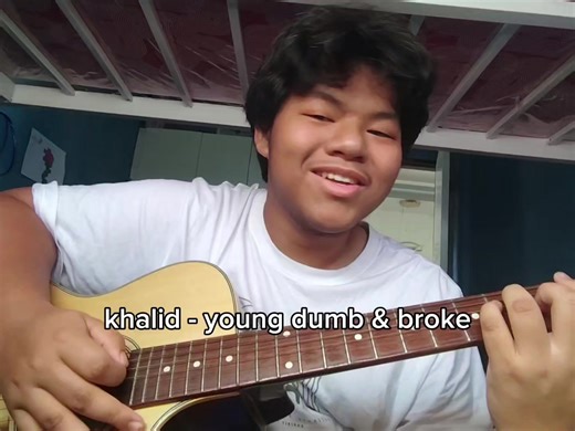 @thegr8khalid - young dumb & broke (can't wait for this video to show up in 10 years time) #chords #funny #cover #guitar #singing #fyppppppppppppppppppppppp #fyp #khalid