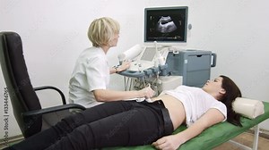 Ultrasound examination, doctor explain diagnosis for patient Stock Video