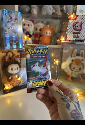 Opening a Surging Sparks booster pack! 💖⚡️✨ #pokemontiktok #pokemon #pokemoncollection #pokemoncards #pokemonpulls