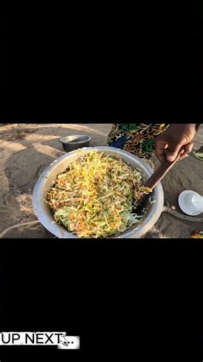Eating Butternut chapatis for the first time in the African Village