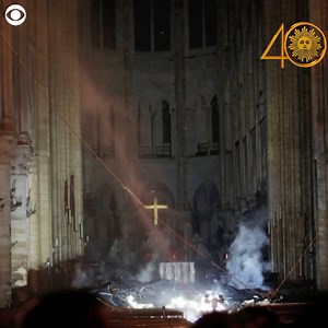 38K views · 1.2K reactions | A golden cross was still glowing as smoke was rising up around an altar inside Notre Dame Cathedral on Monday. Officials said several artifacts, including the Crown of Thorns, were saved. Firefighters said the fire at the cathedral was out. https://cbsn.ws/2PfK7EK | CBS Sunday Morning | Facebook