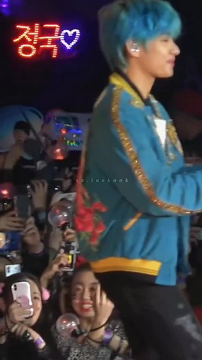 Exciting Stage Performance by Young Adults with Colorful Outfits