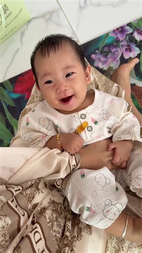 Adorable Baby in Cartoon Onesie: Heartwarming Moments