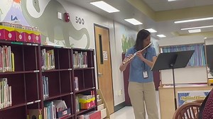 Check out our talented music teacher, Mrs. Bacher playing the flute to our families and community members at our SAC meeting. Great job, Mrs. Bacher! 🐾 🎶 💚 | Highland Elementary School