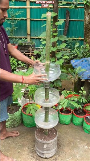 🌿 DIY Vertical Garden Tower From PET Water Jars | Amazing Gardening Hack! 🌱 #shorts #verticalgarden