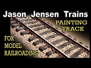 Painting track for our model railroad