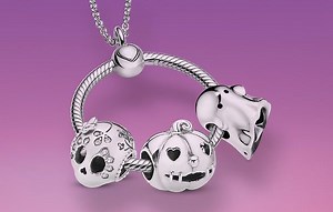 Pandora is selling a special Halloween collection featuring pumpkins and ghost charms