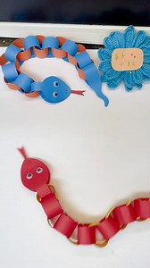 Easy Paper Snake Chain Craft #papersnake #snakechain #papercraft #diyproject #craftforkids #creativeidea #recycledpaper #easycraft #funactivity #diyfun #simplecraft #papercutting #handmadecraft #kidsfun #diyidea | paper craft