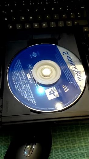 PS2 problem: Clicking noise and close up to laser _ 1 minute for disc spin and load