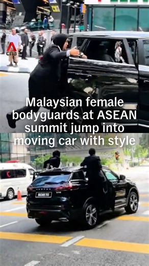 This is not a scene from an action movie - two Malaysian female bodyguards were seen leaping onto a moving car while escorting foreign delegates during the 47th ASEAN Summit. Their slick moves have drawn widespread praise online for their skill and composure. #malaysia #malaysianews | CNA