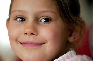 Young artist painting for tsunami relief