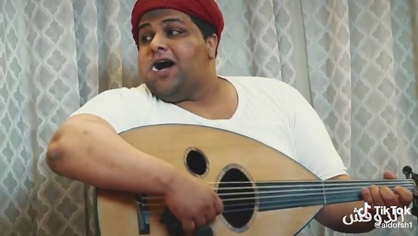 Traditional Iraqi Music Performance in Cultural Attire