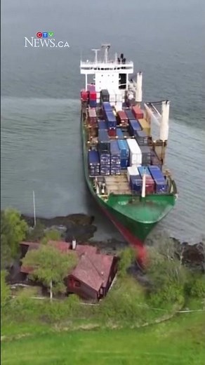 Container ship runs aground dangerously close to a home