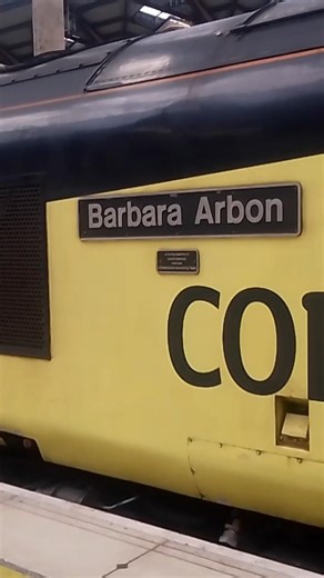 Class 37 057 'Barbara Arbon' on tail end of overhead maintenance train Liverpool Street #class37