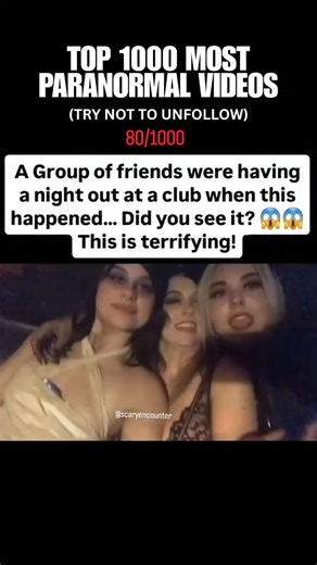 Paranormal Videos on Instagram: "This video captures a group of friends having fun and posing for a camera in what appears to be a nightclub or a lively party setting. The atmosphere is energetic, with loud music and flashing lights. While the friends are smiling and laughing, the text overlay on the video suggests that something "terrifying" is happening in the background, prompting viewers to look closely. This is a common style of social media video designed to create a sense of mystery or a