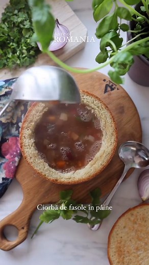 Ever felt that unique blend of comfort and tradition in a single meal? Ciorbă de fasole în pâine, a culinary treasure from the heart of Romania, offers exactly that. This dish isn’t just a meal; it’s a profound journey into the Romanian soul, blending the rustic charm of the countryside with the warmth of a home-cooked meal. Imagine a steaming bowl of bean soup, rich in flavors and spices, served in a hollowed-out loaf of bread. It’s not only a testament to the ingenuity of Romanian cuisine but