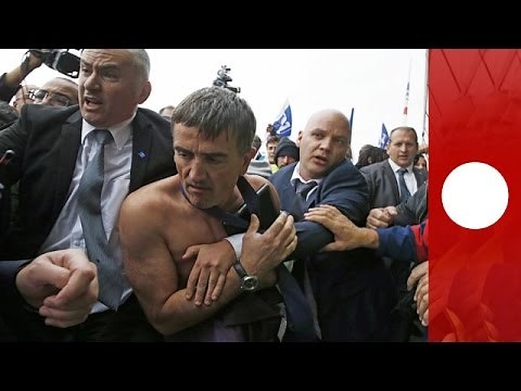 Air France managers' clothes ripped off by angry mob, France