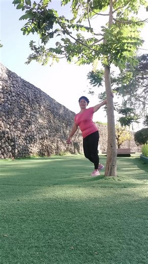 Outdoor Stretching Techniques with a Tree