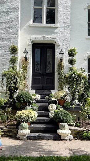 With the first Day of Fall being tomorrow here in Michigan what better time than now to pull together our fall porch?! We grabbed some cornstalks, heirloom pumpkins, mums, and ornamental cabbage and kale from @english_gardens and I am so happy with the final look! It’s still very early in the Fall season so I love how this look blends perfectly into our landscaping with pops of green & white! What do you think of how it turned out?! | The Iron Victorian
