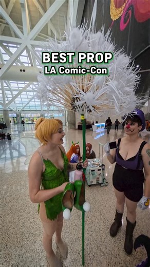 ZIR on Instagram: "Tinker Bell's 🧚 Dandelion was the BEST PROP 🏆 at LA Comic Con 2025!!! #tinkerbell #ursula #comiccon #cosplay #costumeprop"