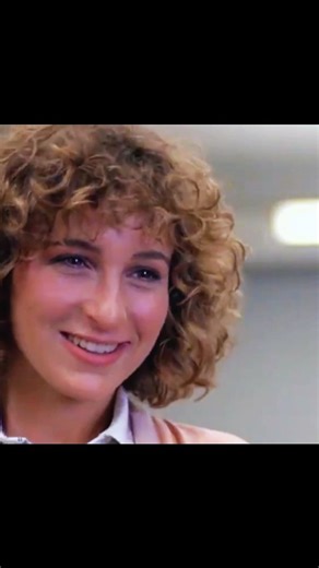 CineMazes on Instagram: "🎬 In Ferris Bueller’s Day Off (1986), this quiet police-station scene becomes one of the film’s most unexpectedly intimate moments. Jeanie Bueller, angry and invisible in her brother Ferris’ shadow, vents to a juvenile delinquent sitting beside her — played by a young, impossibly calm Charlie Sheen. Unlike everyone else in her life, he doesn’t dismiss her frustration. He listens. Trying to reclaim some control, Jeanie slips into a cooler persona and says: 💫“It’s Jeanie