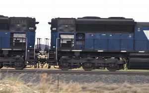 Mullan - Bnsf With Mrl Sd70ace Help Pulls A Coal