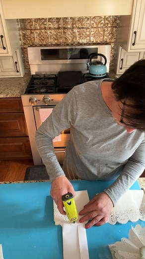 Are you looking for beautiful easy wall decor for your daughter's room or maybe for a shower or wedding? Take a look at how you can make these amazing doily flowers. If you would like the flowers to be colored you can dry the paper doilies before you start making the flowers. | The Crafty Decorator