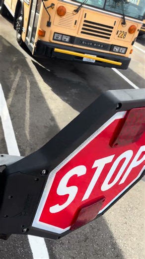 First Light stop sign on a Blue Bird TC-2000 (2002 mod. Year) (Cummins ISB 5.9L)