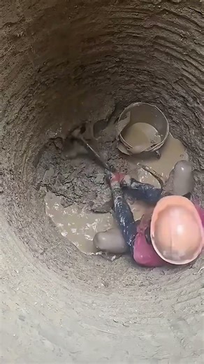 Old-Style Well Digging – Workers Dig Deep Using Only Hand Tools